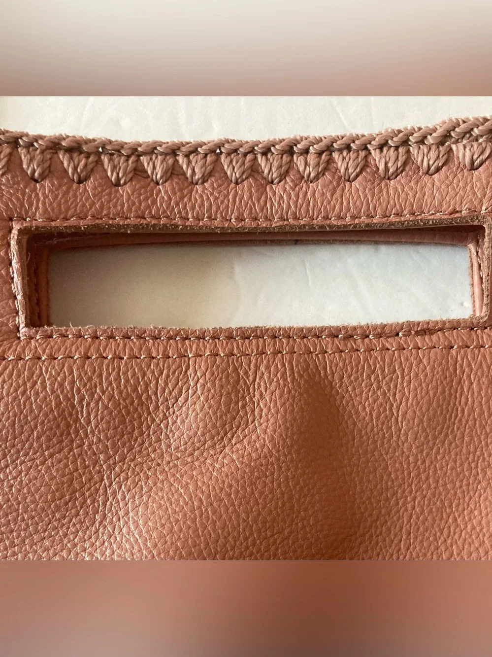 The Sak coral lite pink Leather Cutout-Handle Crossbody Clutch Hand Stitched